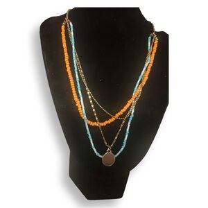 Necklace by ETC! Mix of Gold-tone chain and beaded stands